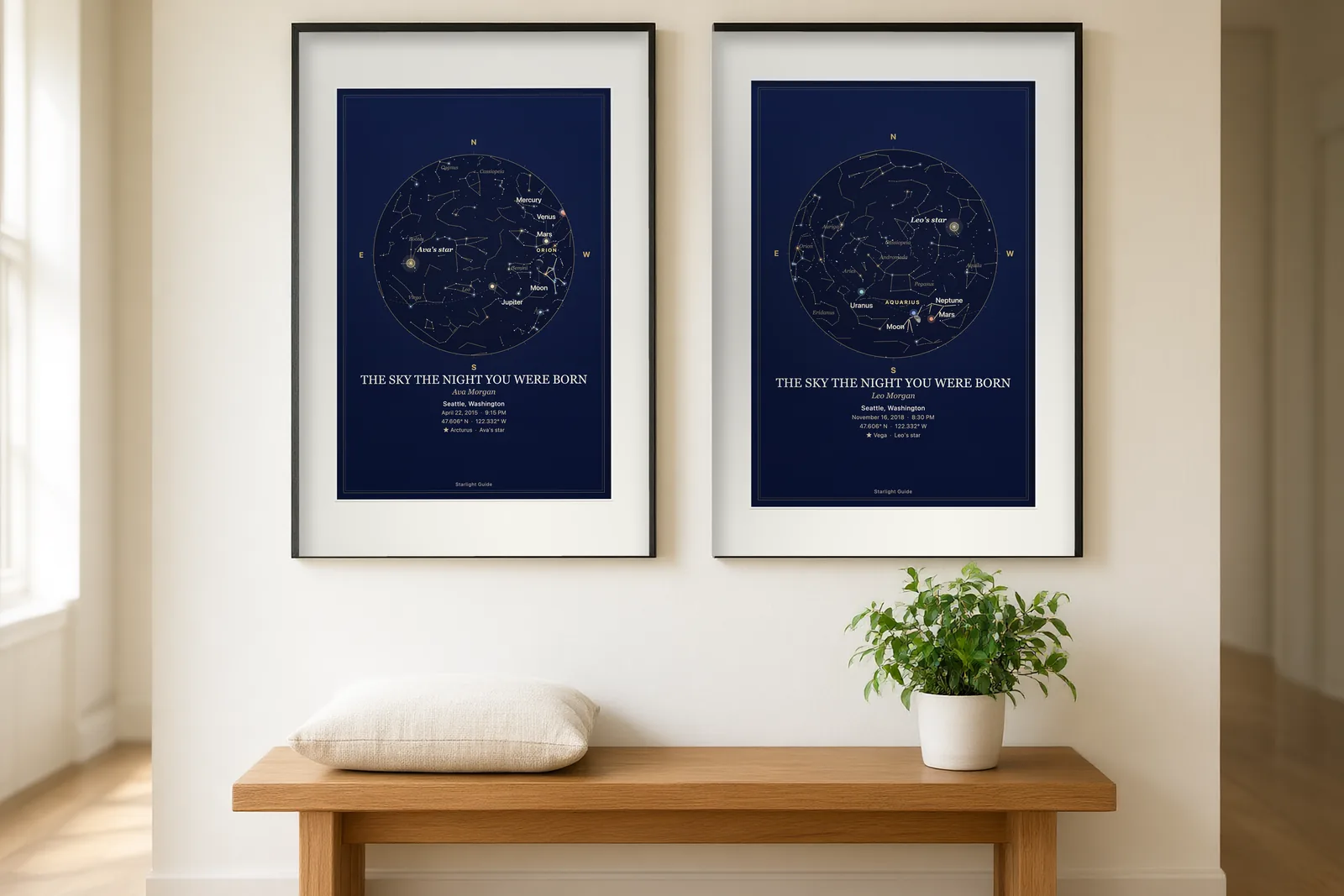 Two matching framed star maps for two different dates hanging side by side above a bench.